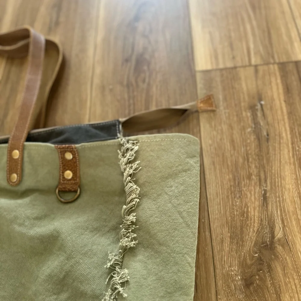 Myra Bag upcycled canvas & cowhide weekender bag